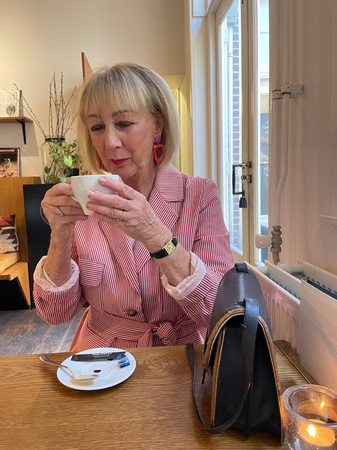 Red and white striped jacket on jeans