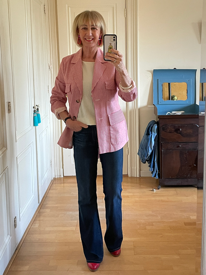 Red and white striped jacket on jeans