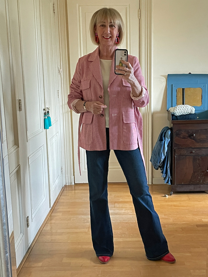 Red and white striped jacket on jeans