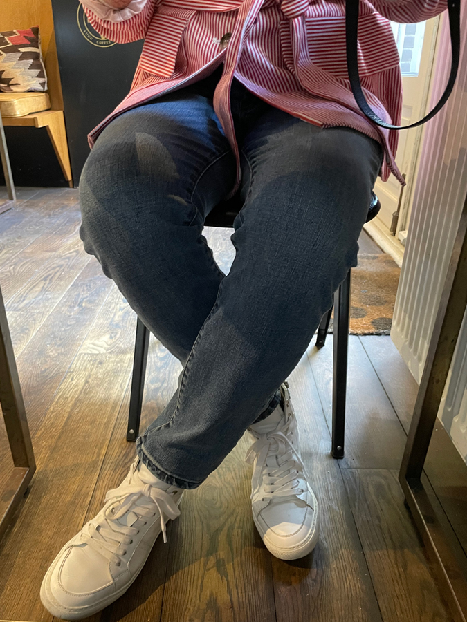 Red and white striped jacket on jeans