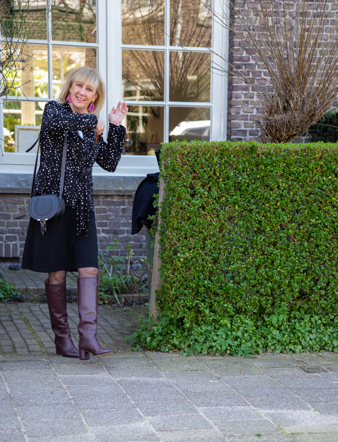 Black and white blazer with a black skirt