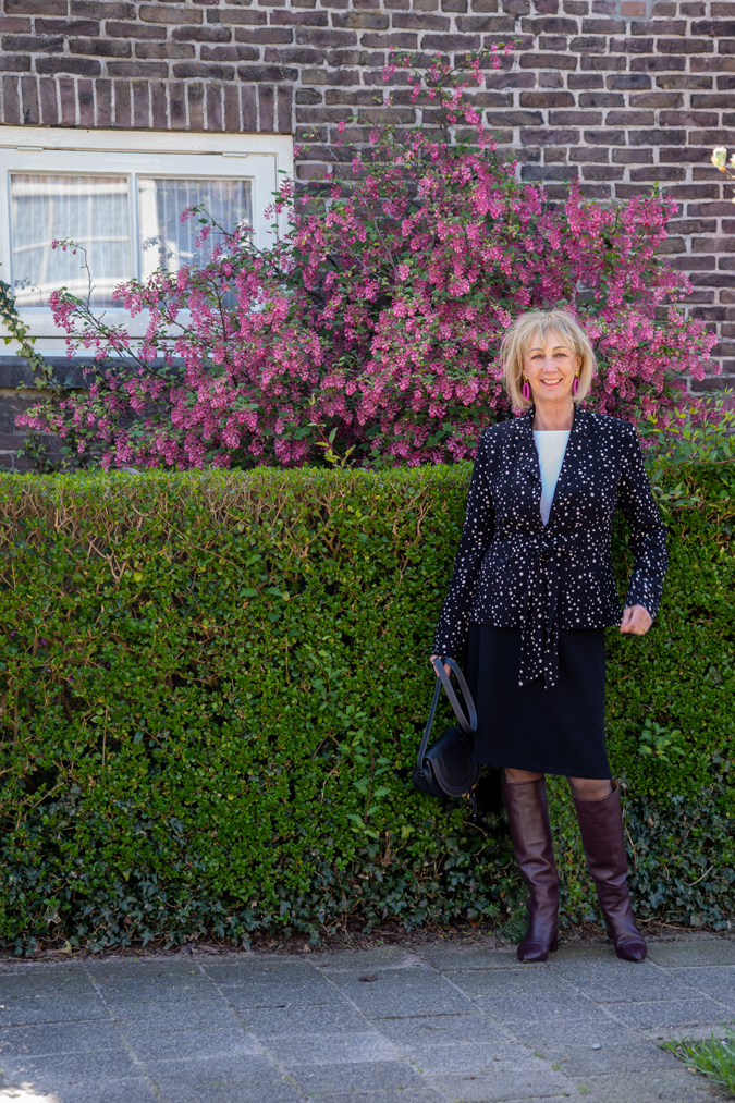 Black and white blazer with a black skirt