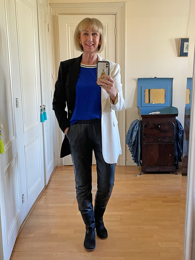 black leather trousers with black and white blazer