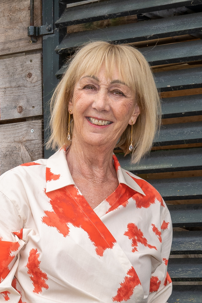 Orange and cream top and earrings by Lara Design