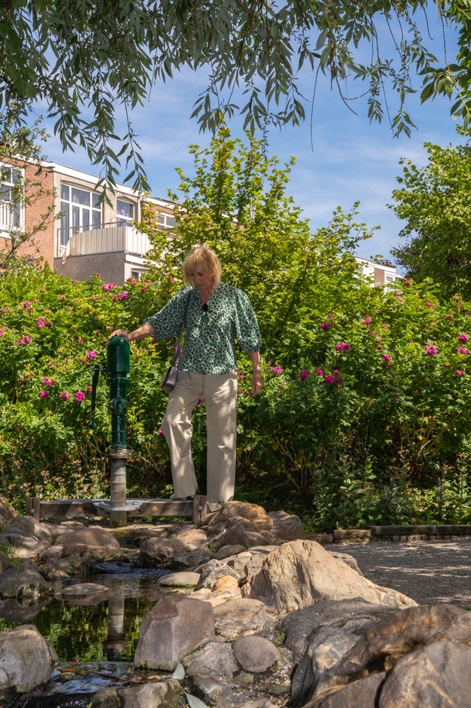Pebble coloured trousers with a peplum top