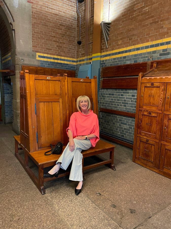 pebble coloured trousers with a neon pink top