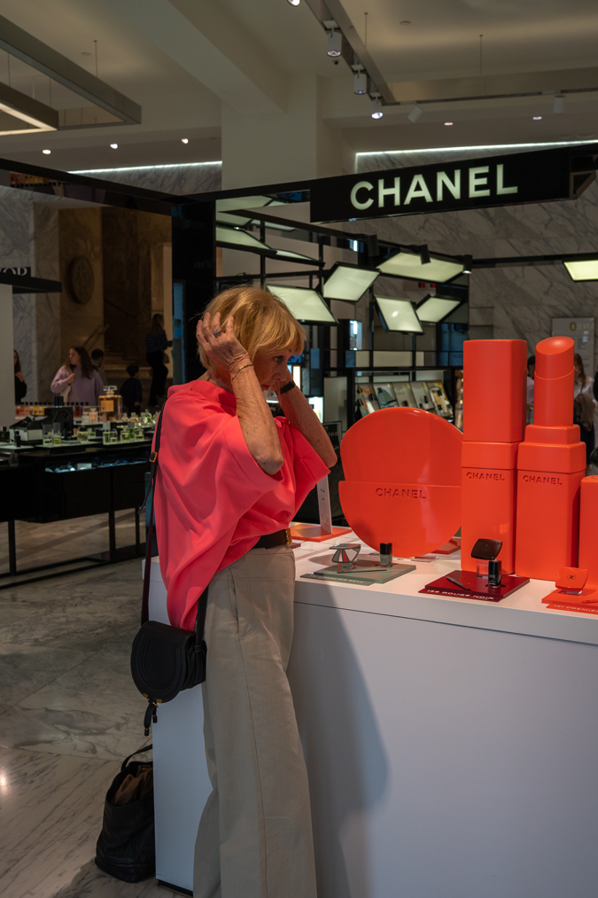 pebble coloured trousers with a neon pink top