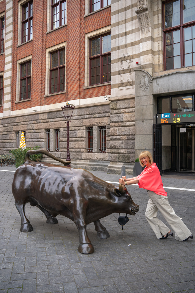 pebble coloured trousers with a neon pink top