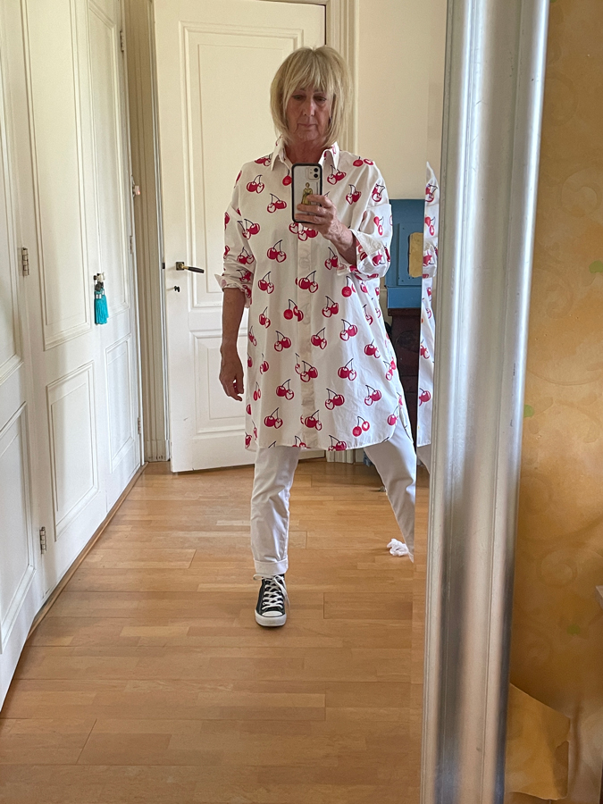 Max Mara cherry print dress with white trousers