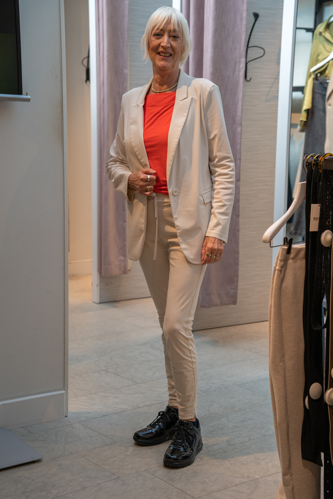 Helena in her cream suit