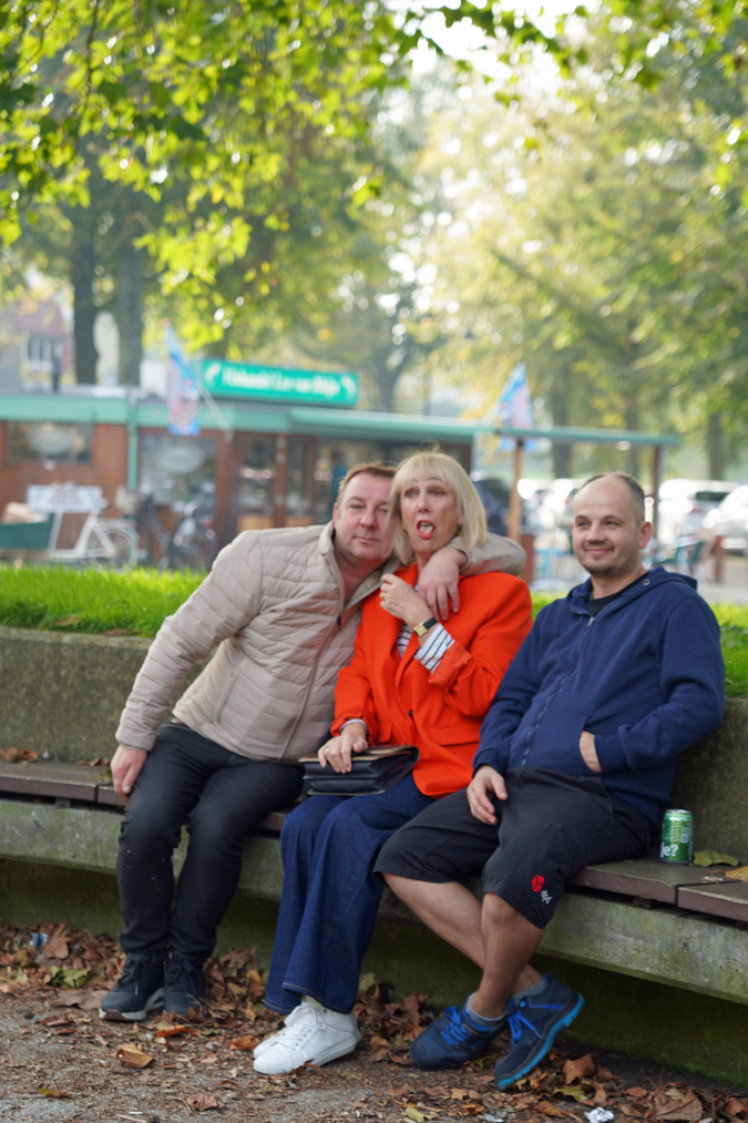 Wide leg jeans with an oversized orange blazer