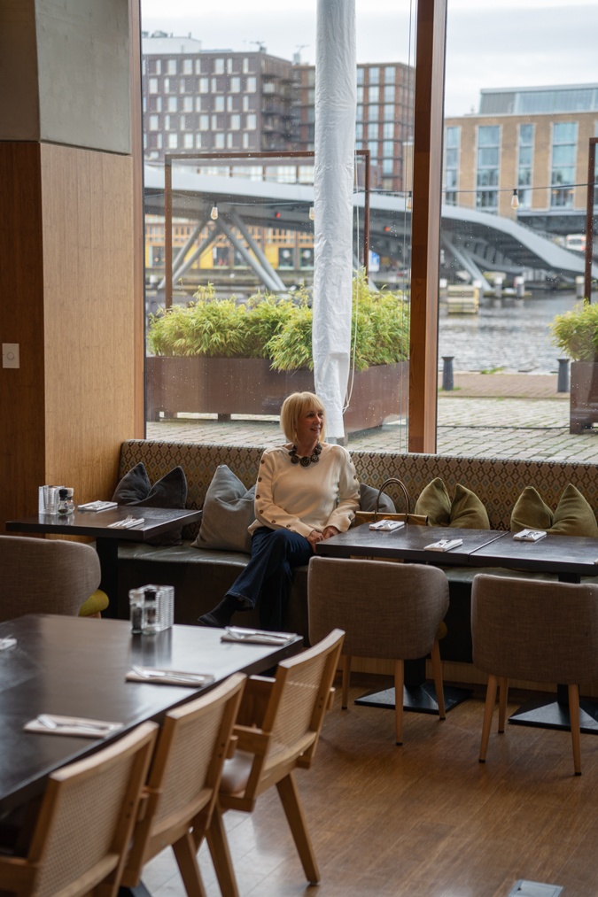 Flared jeans with a cream jumper
