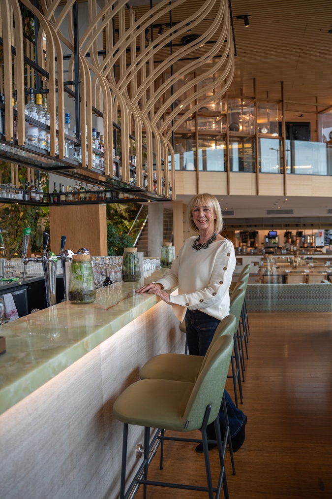 Flared jeans with a cream jumper