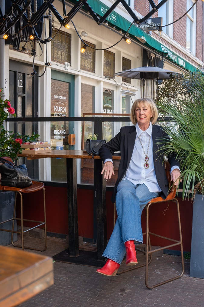 Black blazer with wide leg jeans
