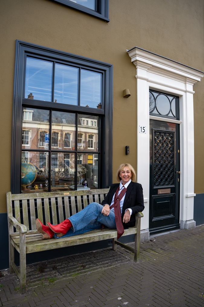 Black blazer with wide leg jeans