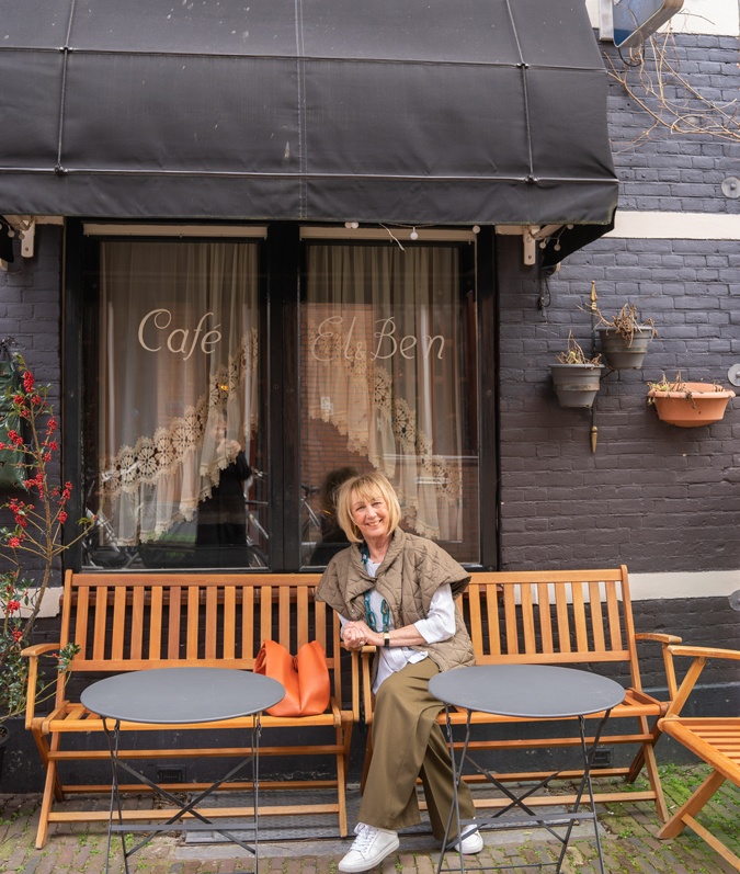 Olive coloured trousers with a pale blue blouse