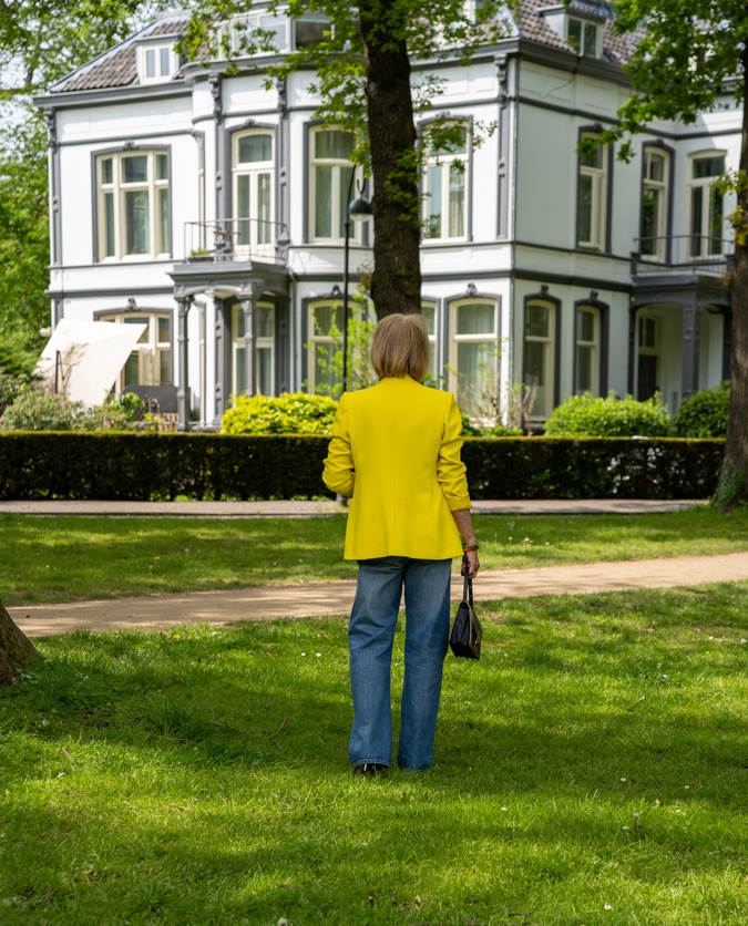 Yellow blazer with wide leg jeans