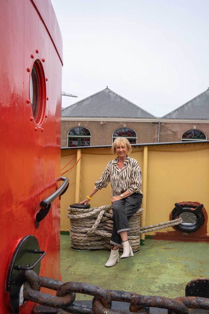 Man repeller jeans with a green and cream shirt