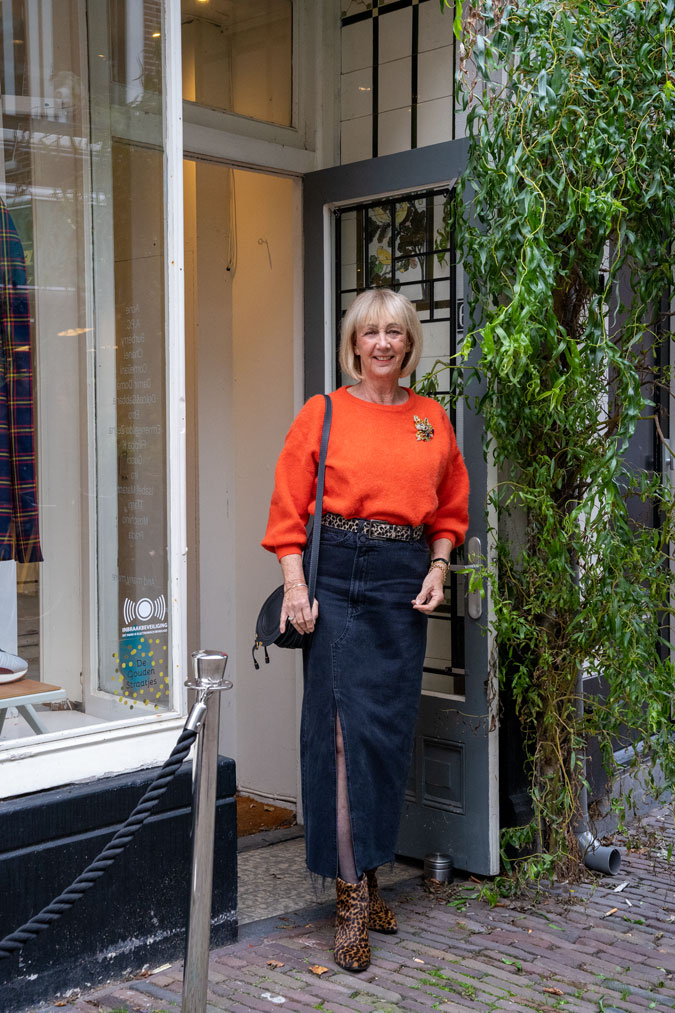 Long denim skirt with a fluffy orange jumper