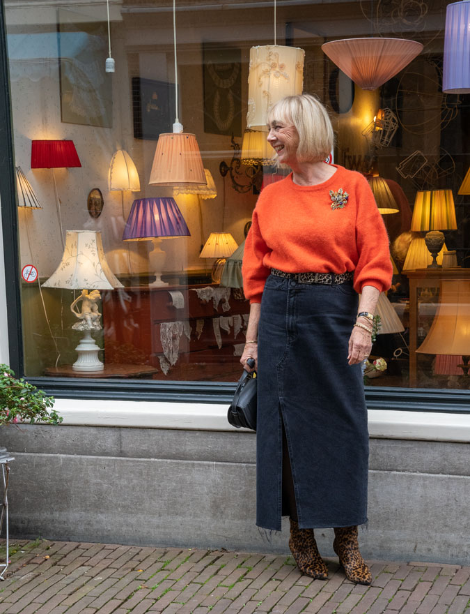 Long denim skirt with a fluffy orange jumper