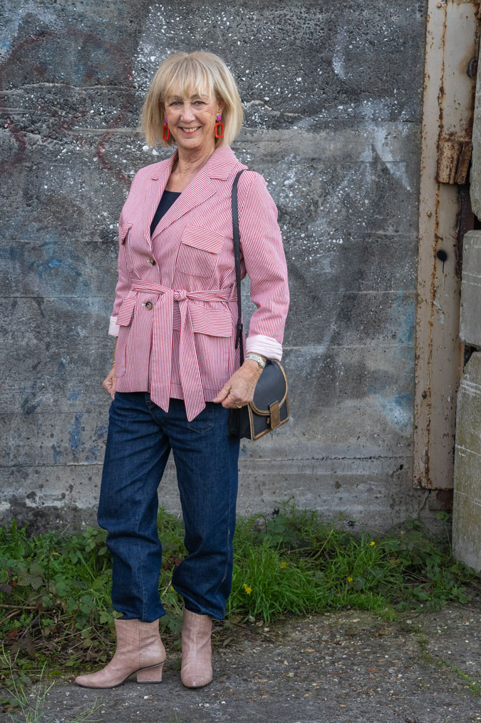 Red and white striped jacket with baggy jeans