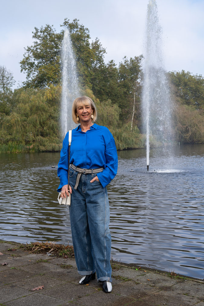 Wide jeans with a bright blue shirt