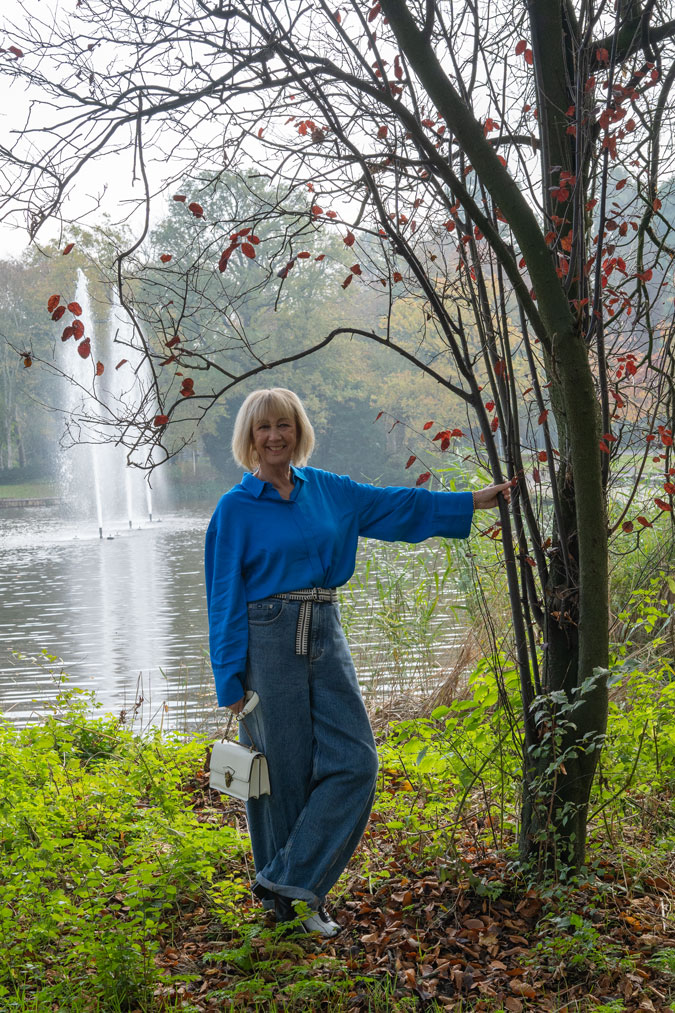 Wide jeans with a bright blue shirt