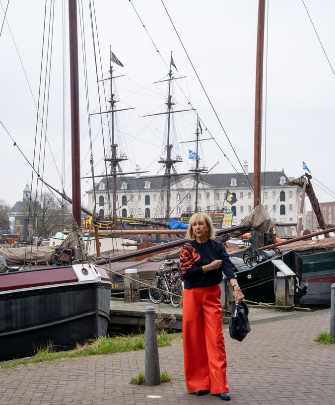 Orange pleather trousers and sequinned sweater