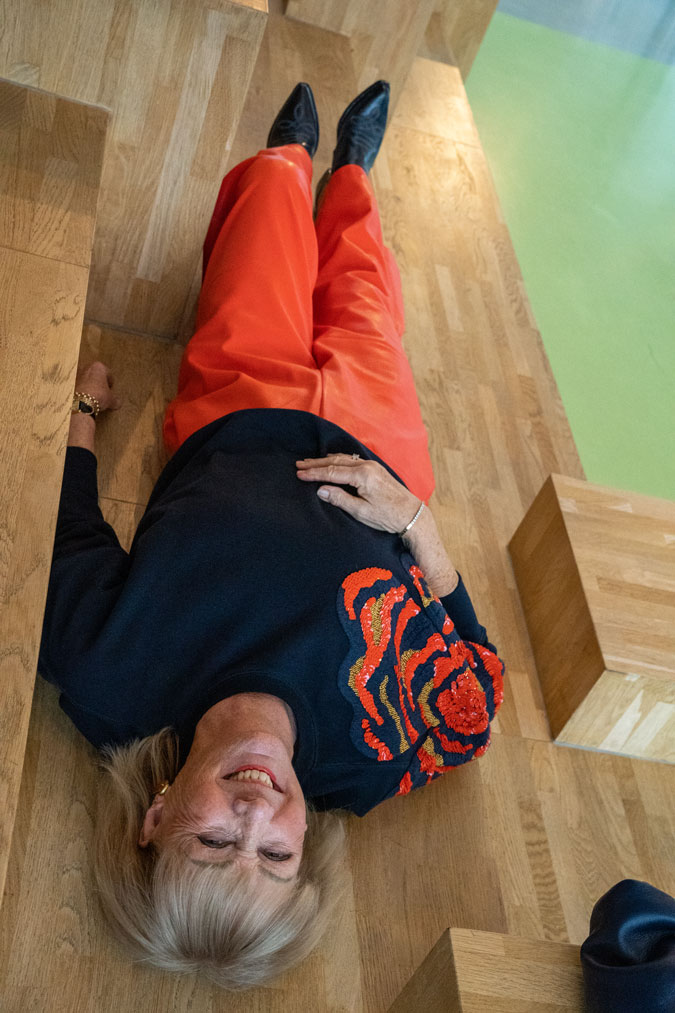 Orange pleather trousers and sequinned sweater