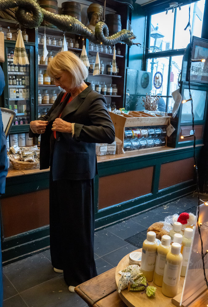 Black trouser suit with wide legs at Van de Pigge pharmacy