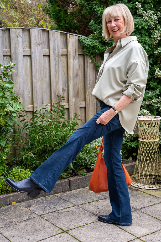 Oversized pale green shirt with blue cowboy boots
