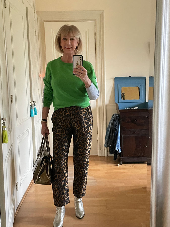 golden leopard trousers with a green jumper