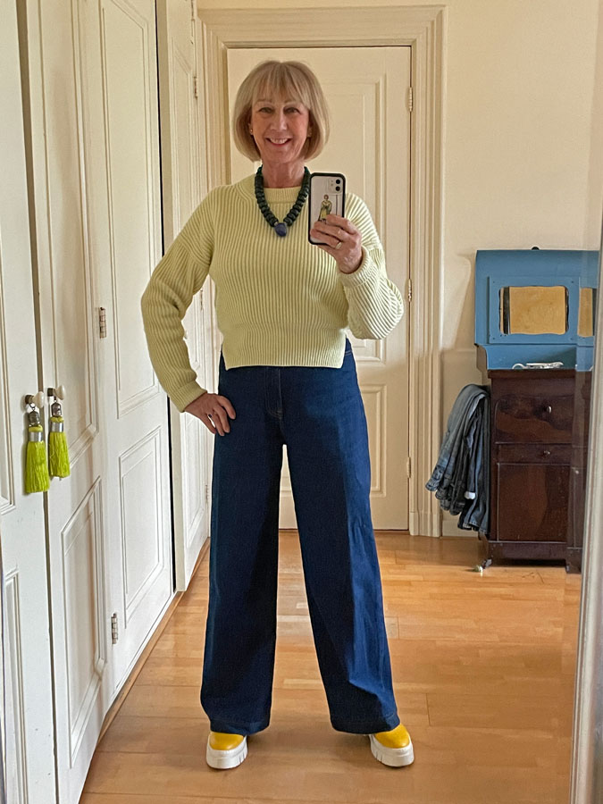 Jeans outfit with soft yellow jumper and bright yellow shoes