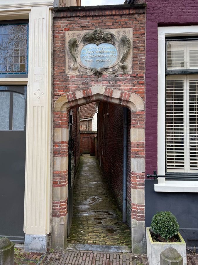 The entrance of an almshouse courtyard