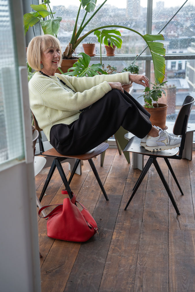 Wide black trousers with the soft yellow jumper