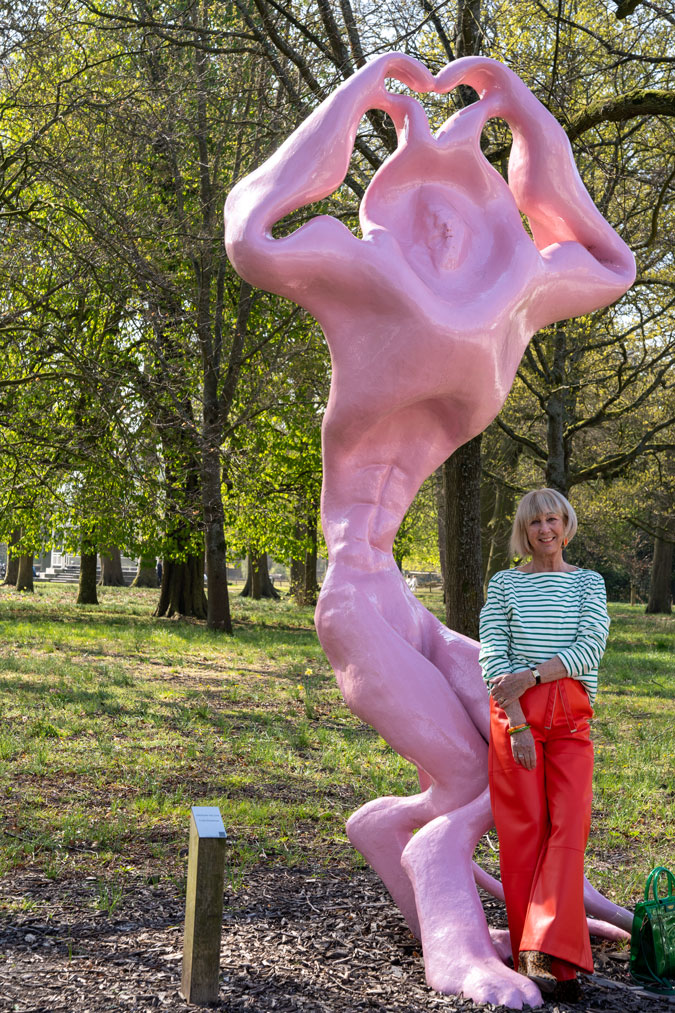 Orange pleather trousers with a green and white striped top