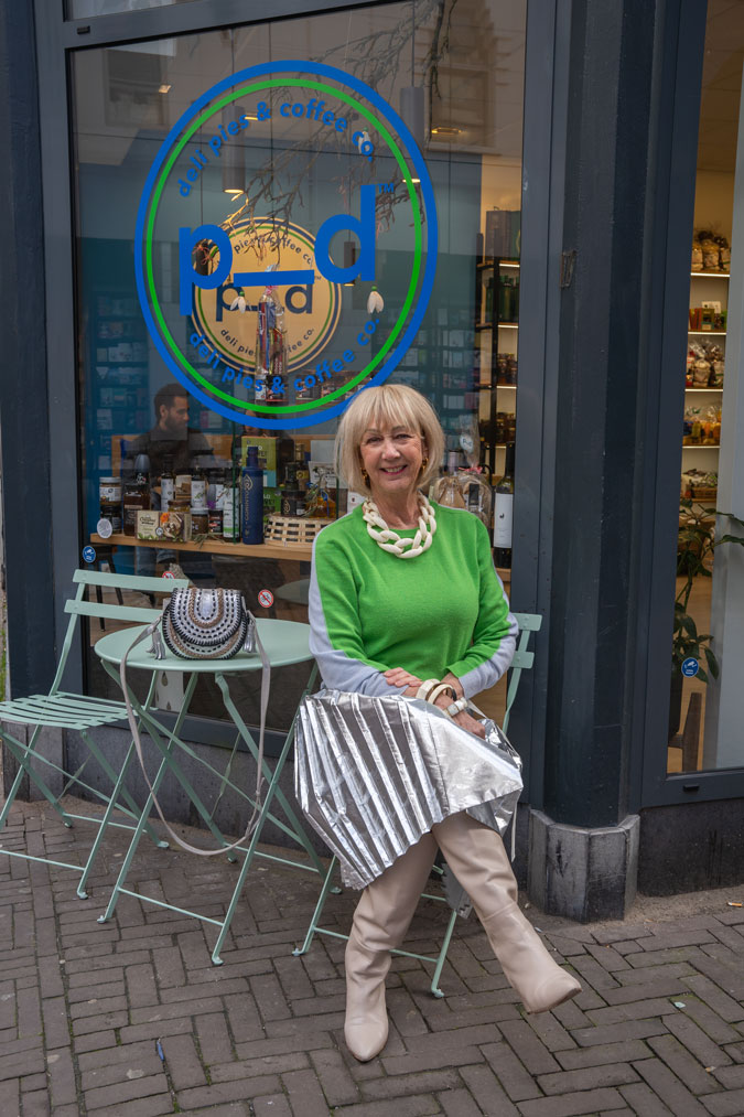 Silver skirt with a green jumper