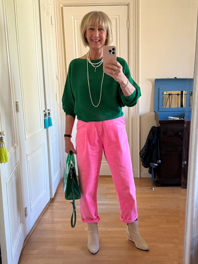 green jumper with pink trousers
