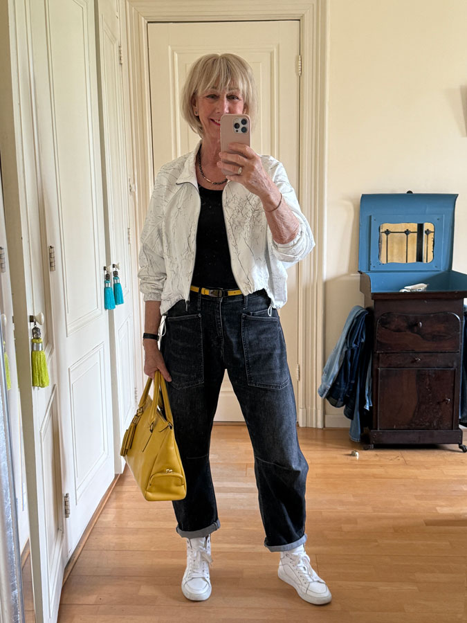 white bomber jacket with barrel jeans