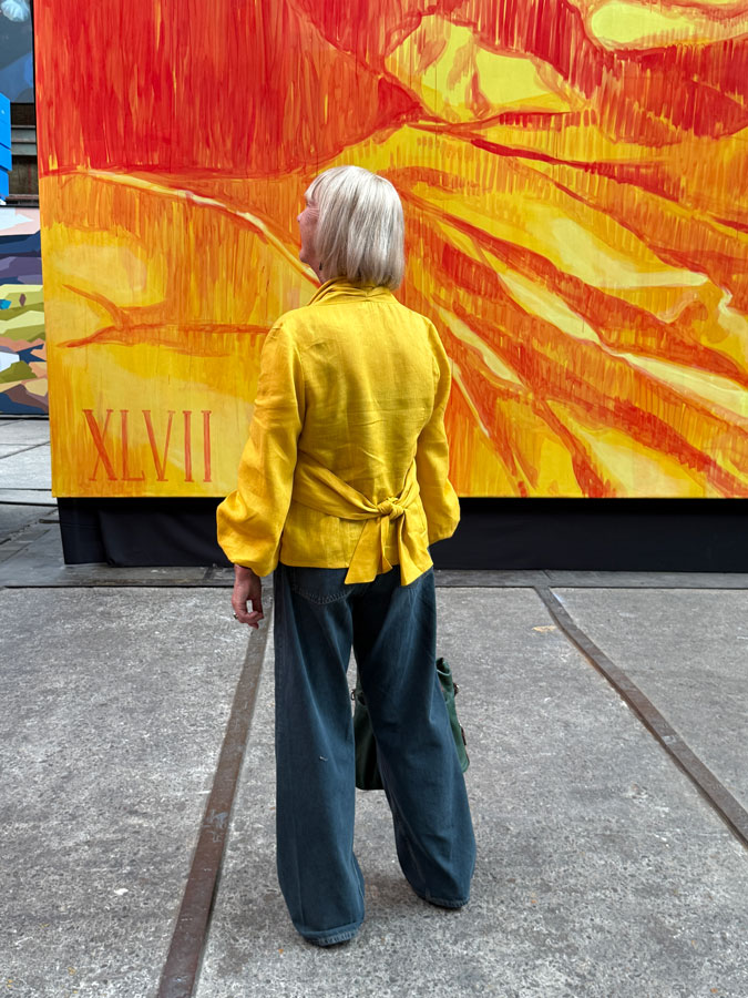 Golden yellow blouse as a jacket, Mural by Keya Tama