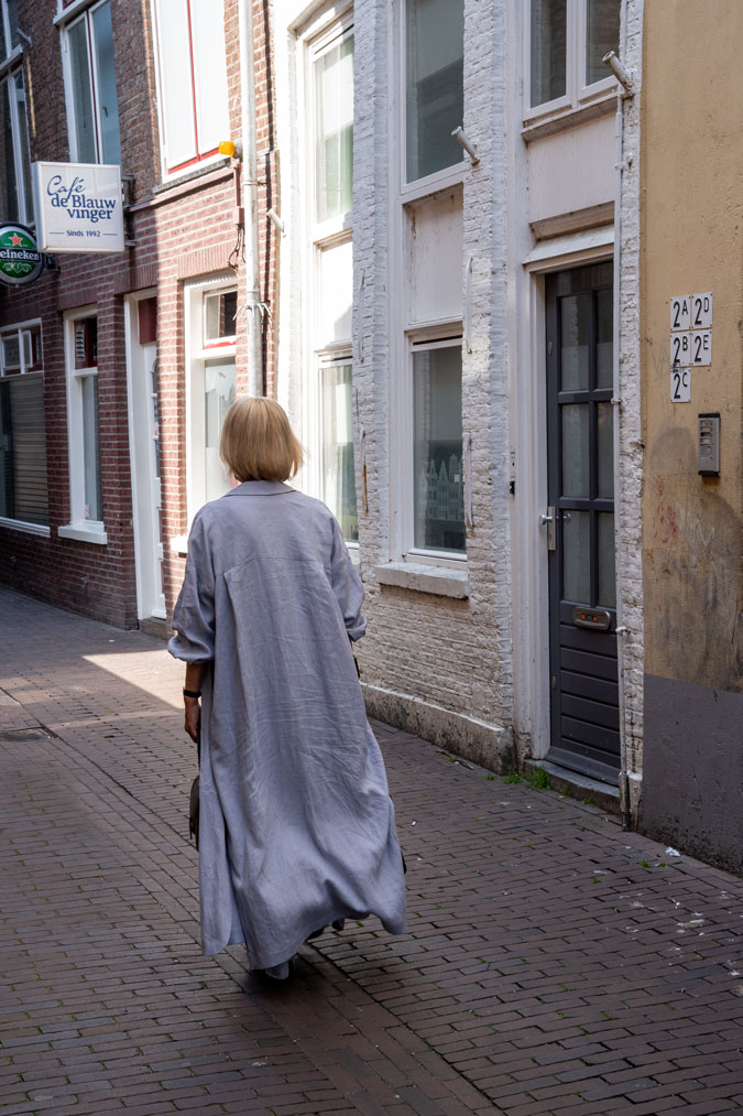 Ice blue linen trousers with a long jacket