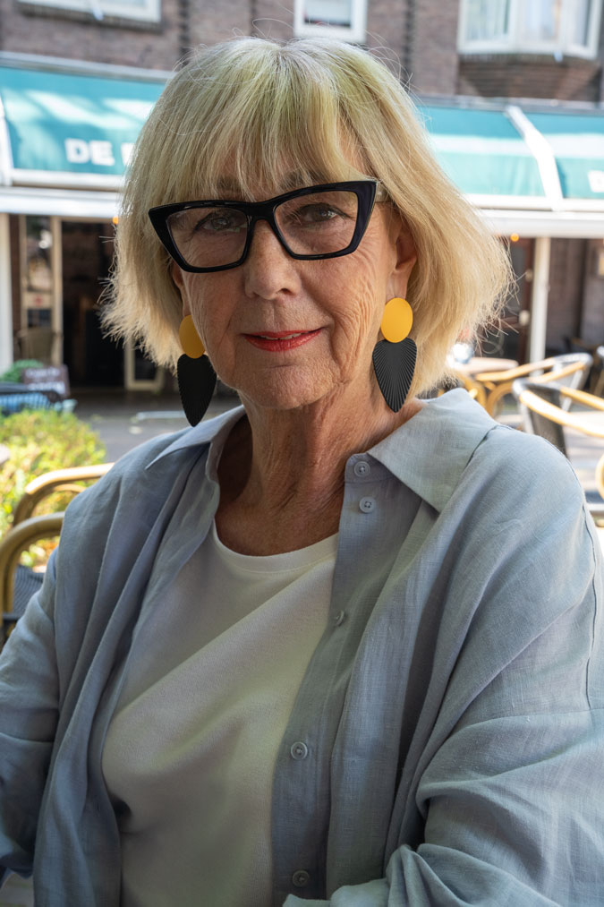 Ice blue linen trousers with a long jacket