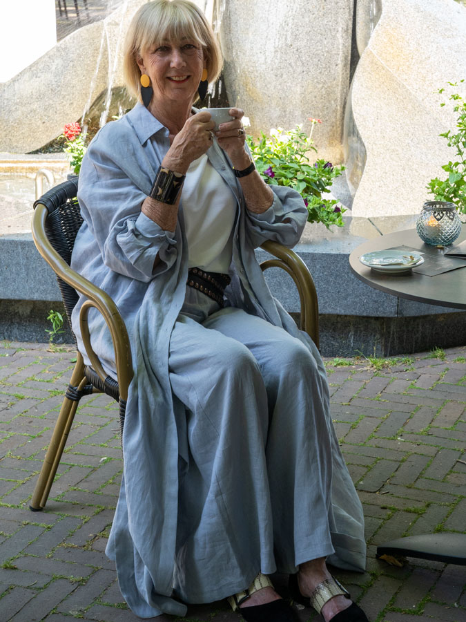 Ice blue linen trousers with a long jacket