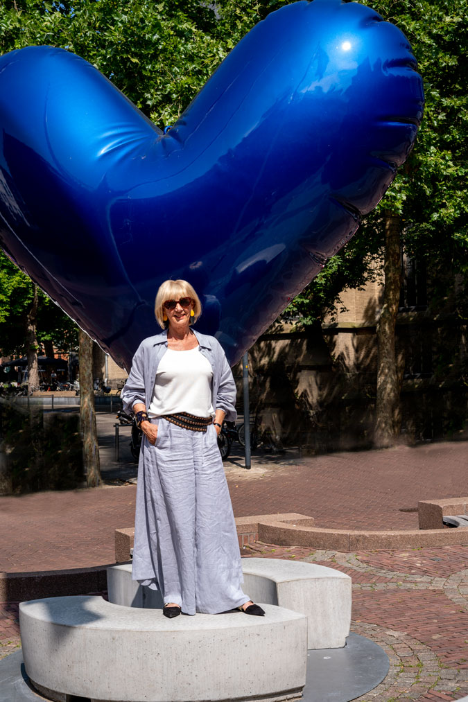 Ice blue linen trousers with a long jacket