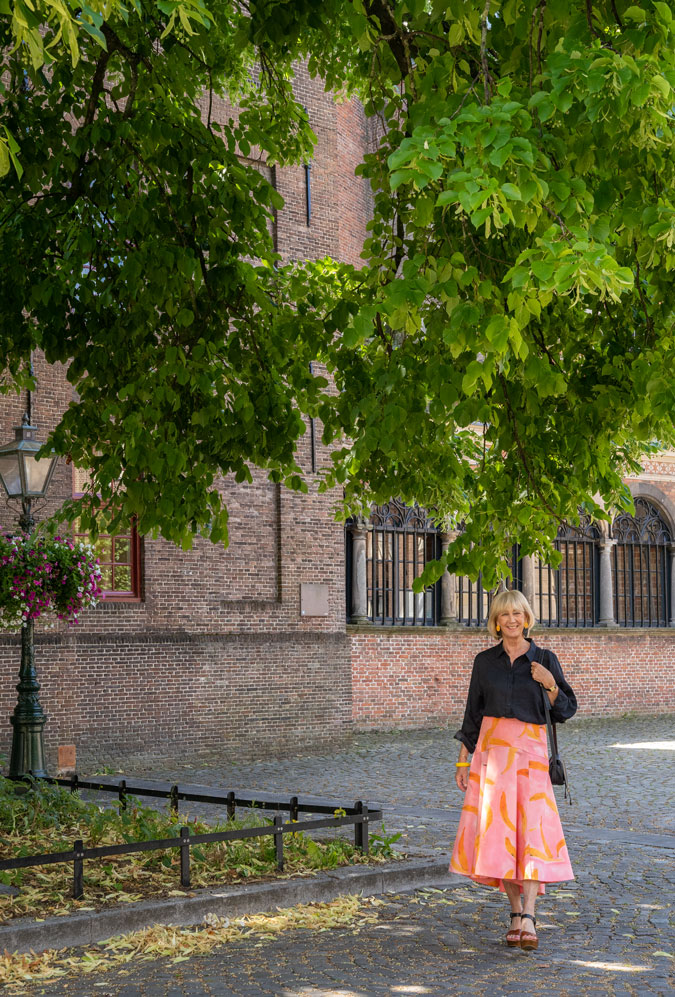 Pink patterned skirt with a black shirt