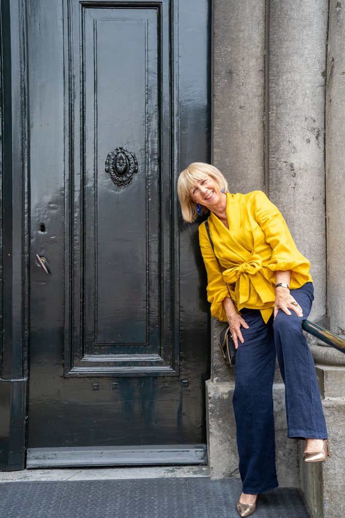 Golden yellow blouse with blue linen trousers