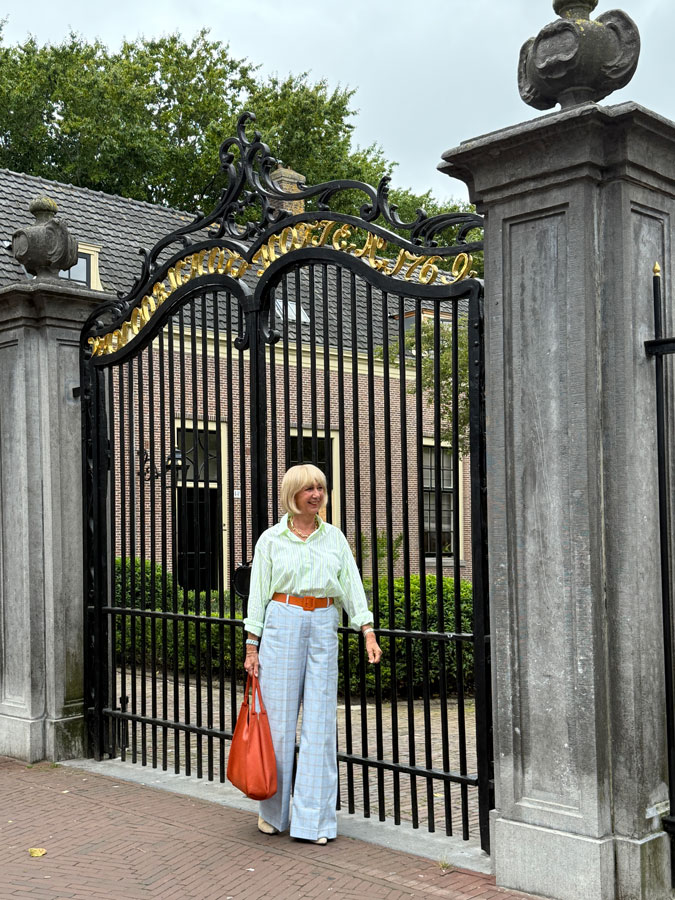 Light blue checked trousers with a yellow striped shirt