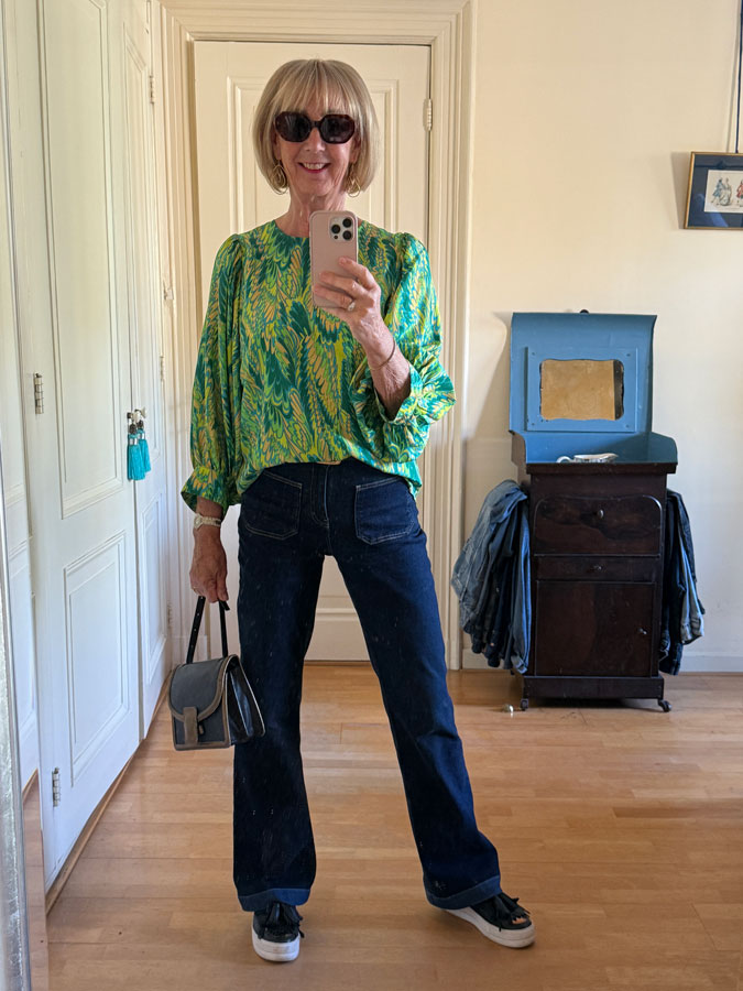 Green and yellow silk blouse with jeans