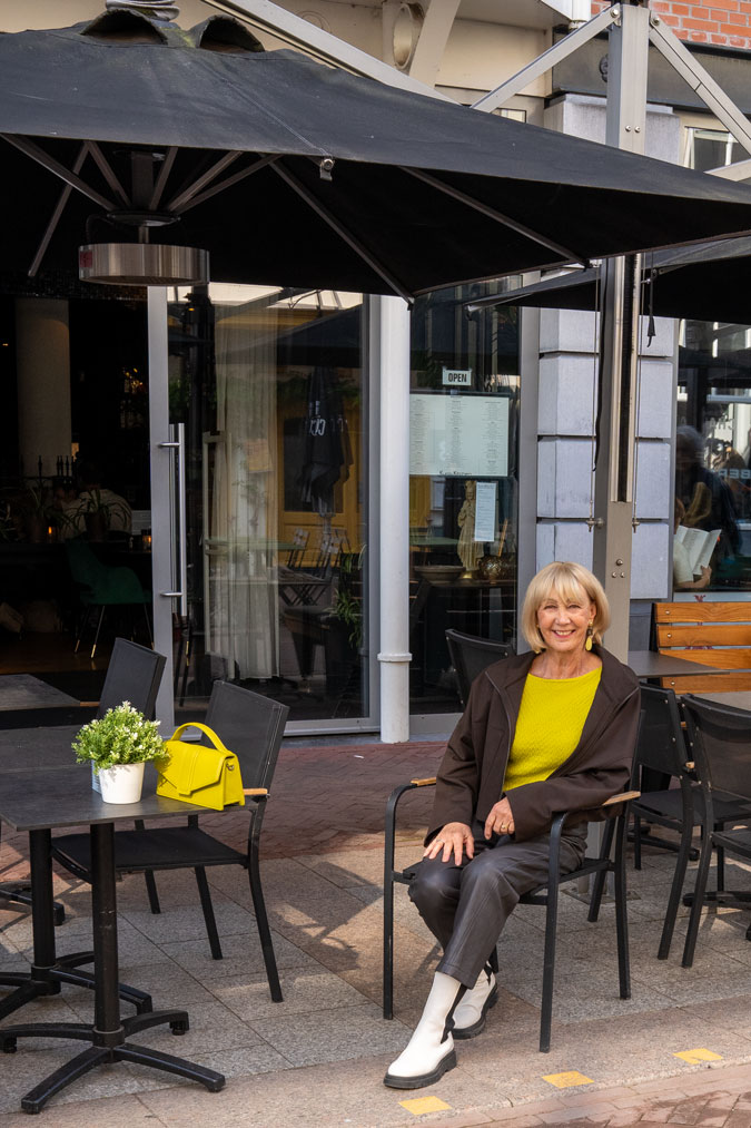 Brown swing jacket with brown vegan leather trousers