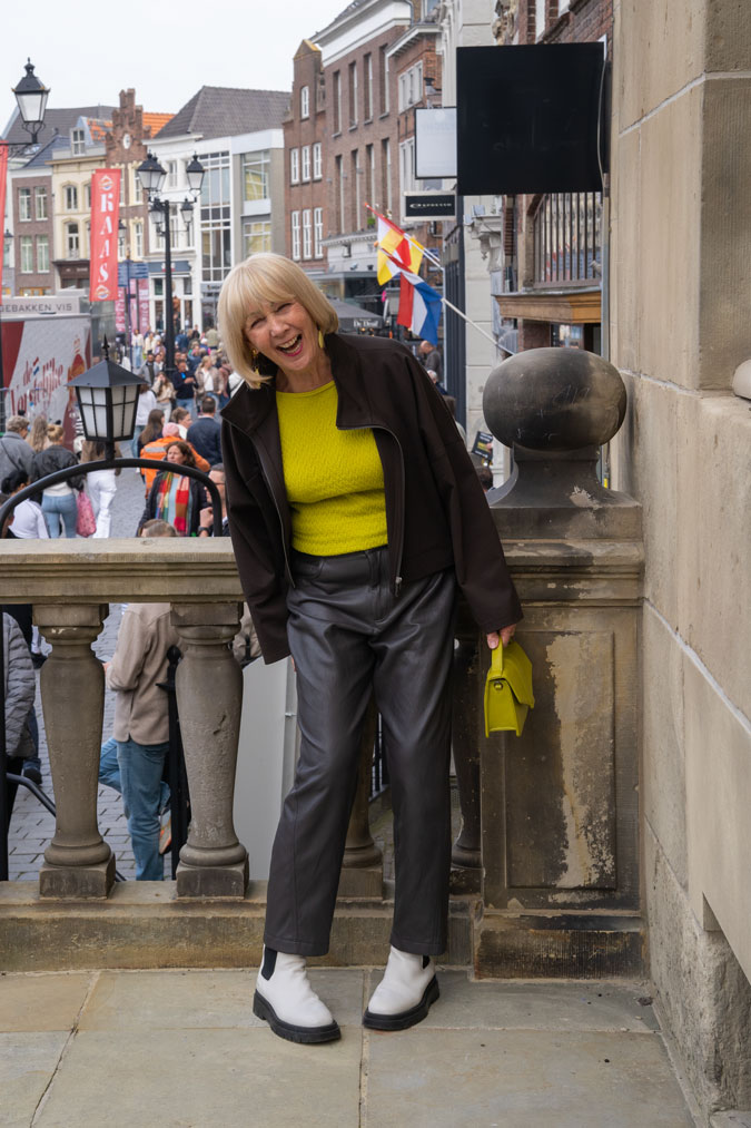 Brown swing jacket with brown vegan leather trousers